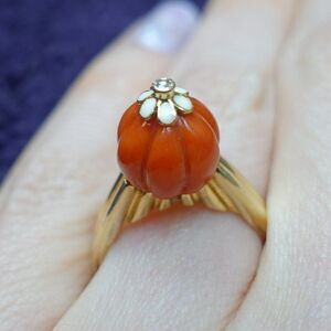 precious dumpling coral ring with enamel flower and diamond on top